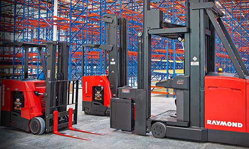 Three rental forklifts from Pengate parked in warehouse